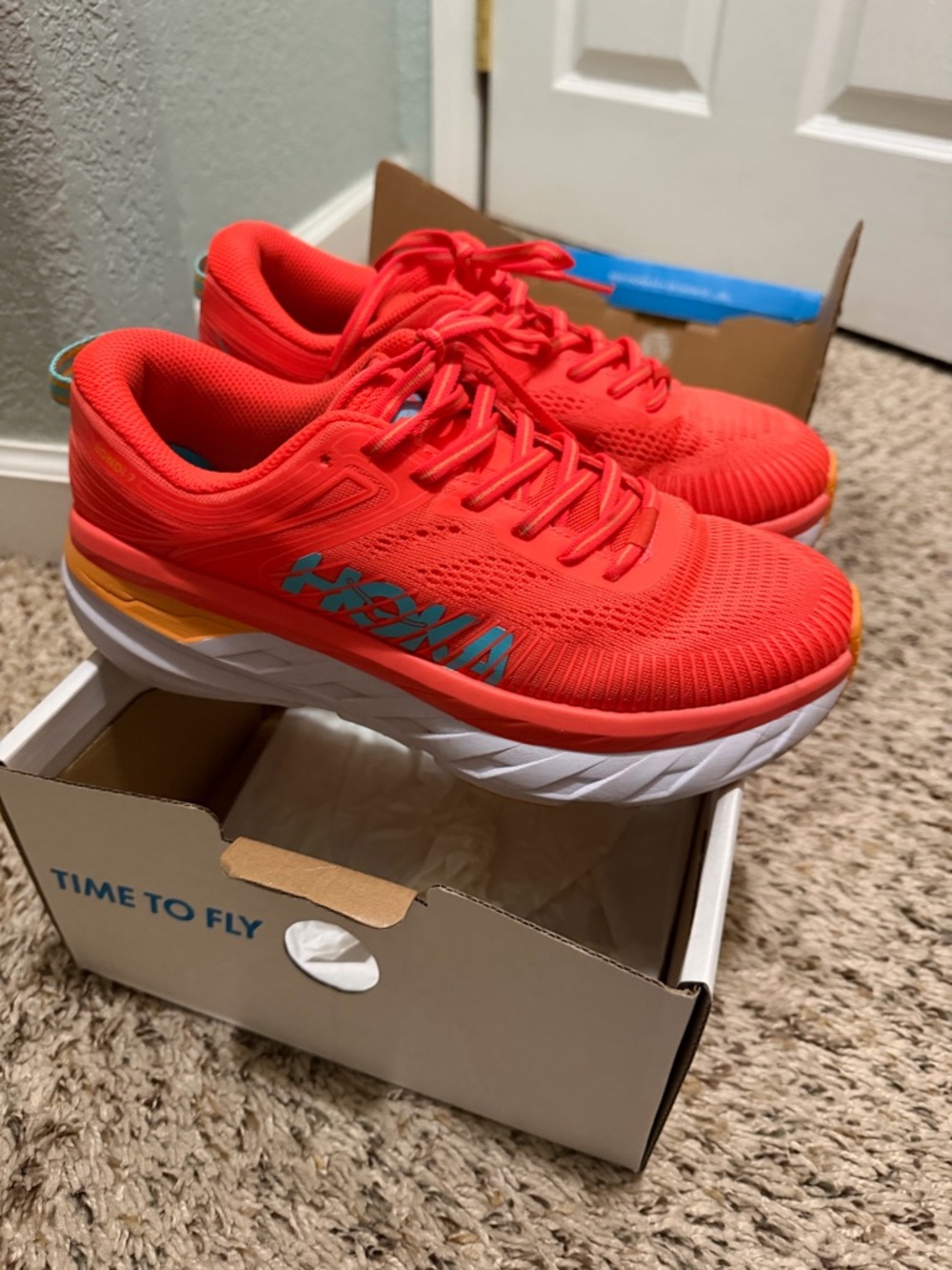 Hoka Coral-Orange Running Shoe with Blue Logo - Picture 2 of 4